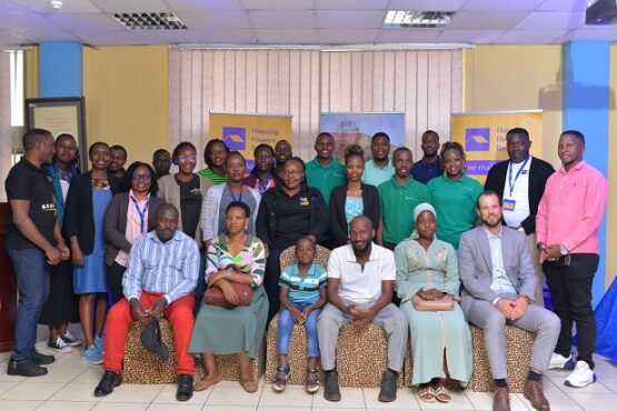 A group photo of officials from Housing Finance Bank and Easy Housing