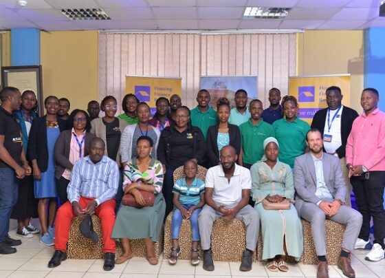 A group photo of officials from Housing Finance Bank and Easy Housing