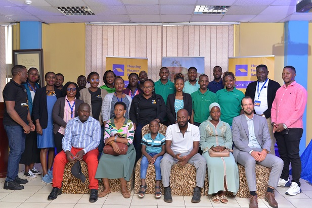 A group photo of officials from Housing Finance Bank and Easy Housing