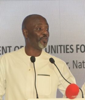 Dr. Joseph Muvawala, Executive Director of the National Planning Authority, addressing Indian investors.