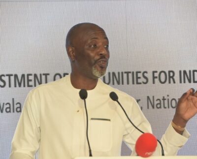 Dr. Joseph Muvawala, Executive Director of the National Planning Authority, addressing Indian investors.