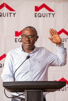 Nuhu Kanyike testifying during the Unilever- Equity Bank partnership launch at Sheraton Hotel Kampala